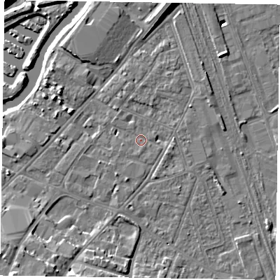Shaded relief map of the ground around NG241PD, computed from Environment Agency LiDAR. The ground here sits at about 12 m above sea level and falls 12 m across the surrounding 800 m. Surface water reaching this point runs off ground lying to the north-north-east, 1.6 m higher.
