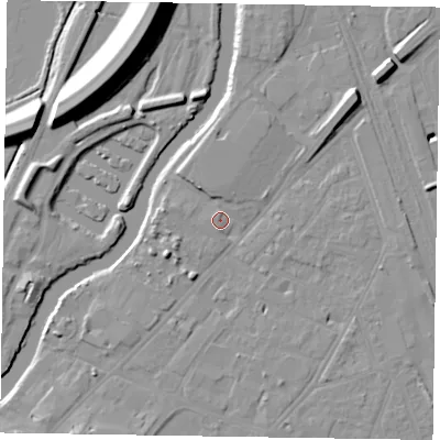 Shaded relief map of the ground around NG241TX, computed from Environment Agency LiDAR. The ground here sits at about 12 m above sea level and falls 16 m across the surrounding 800 m. Surface water reaching this point runs off ground lying to the west-south-west, 3.9 m higher.