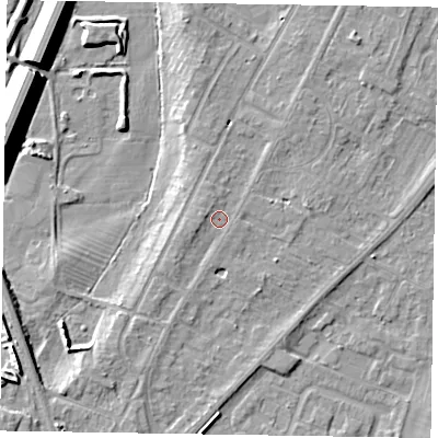 Shaded relief map of the ground around NG242AA, computed from Environment Agency LiDAR. The ground here sits at about 12 m above sea level and falls 12 m across the surrounding 800 m. Surface water reaching this point runs off ground lying to the west-north-west, 1.6 m higher.