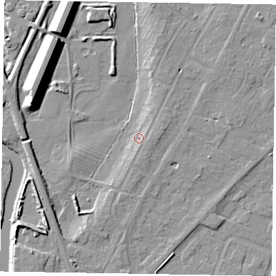 Shaded relief map of the ground around NG242AZ, computed from Environment Agency LiDAR. The ground here sits at about 11 m above sea level and falls 13 m across the surrounding 800 m. Surface water reaching this point runs off ground lying to the north-east, 2.9 m higher.