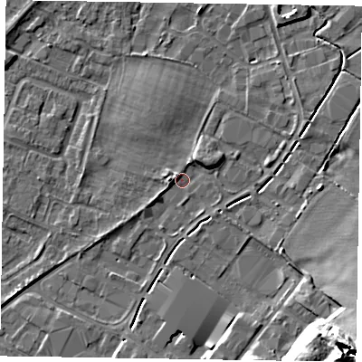 Shaded relief map of the ground around NG242DT, computed from Environment Agency LiDAR. The ground here sits at about 11 m above sea level and falls 18 m across the surrounding 800 m. Surface water reaching this point runs off ground lying to the south-east, 17.5 m higher.