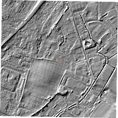Shaded relief map of the ground around NG242DX, computed from Environment Agency LiDAR. The ground here sits at about 11 m above sea level and falls 5 m across the surrounding 800 m. Surface water reaching this point runs off ground lying to the south, 3.6 m higher.