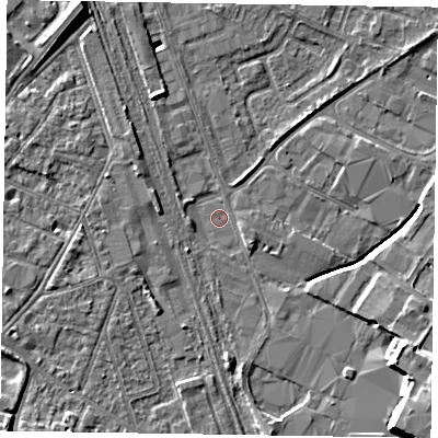 Shaded relief map of the ground around NG242EU, computed from Environment Agency LiDAR. The ground here sits at about 12 m above sea level and falls 12 m across the surrounding 800 m. Surface water reaching this point runs off ground lying to the south-east, 7.9 m higher.