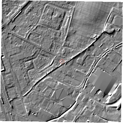 Shaded relief map of the ground around NG242HE, computed from Environment Agency LiDAR. The ground here sits at about 12 m above sea level and falls 10 m across the surrounding 800 m. Surface water reaching this point runs off ground lying to the south, 3.5 m higher.
