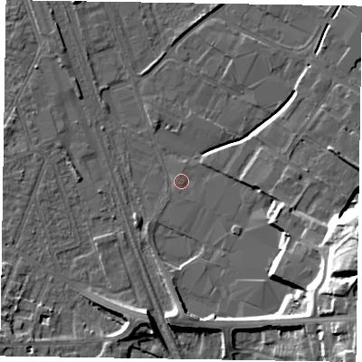 Shaded relief map of the ground around NG242JF, computed from Environment Agency LiDAR. The ground here sits at about 12 m above sea level and falls 21 m across the surrounding 800 m. Surface water reaching this point runs off ground lying to the south-east, 19.4 m higher.