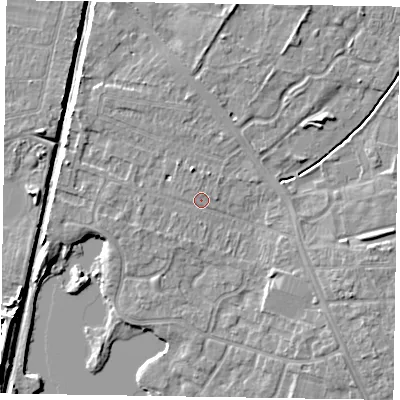 Shaded relief map of the ground around NG243AZ, computed from Environment Agency LiDAR. The ground here sits at about 17 m above sea level and falls 9 m across the surrounding 800 m. Surface water reaching this point runs off ground lying to the north-north-west, 2.1 m higher.