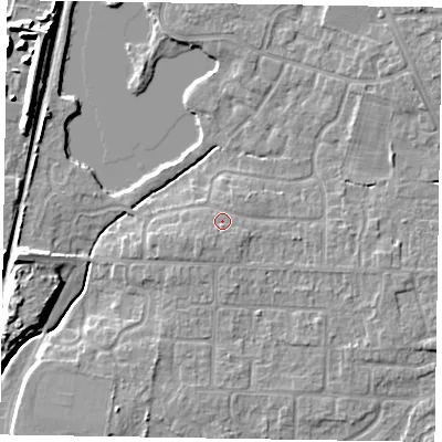Shaded relief map of the ground around NG243BT, computed from Environment Agency LiDAR. The ground here sits at about 17 m above sea level and falls 9 m across the surrounding 800 m. Surface water reaching this point runs off ground lying to the south-south-west, 1.2 m higher.