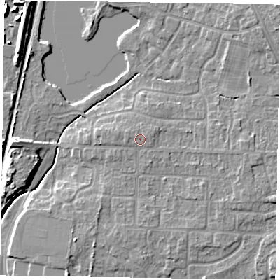 Shaded relief map of the ground around NG243DN, computed from Environment Agency LiDAR. The ground here sits at about 18 m above sea level and falls 9 m across the surrounding 800 m. Surface water reaching this point runs off ground lying to the north-west, 0.6 m higher.