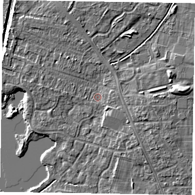 Shaded relief map of the ground around NG243FB, computed from Environment Agency LiDAR. The ground here sits at about 16 m above sea level and falls 8 m across the surrounding 800 m. Surface water reaching this point runs off ground lying to the east-south-east, 3.1 m higher.
