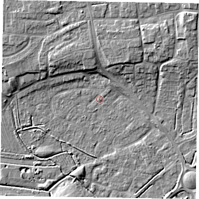Shaded relief map of the ground around NG243HN, computed from Environment Agency LiDAR. The ground here sits at about 13 m above sea level and falls 9 m across the surrounding 800 m. Surface water reaching this point runs off ground lying to the north-north-west, 5.4 m higher.