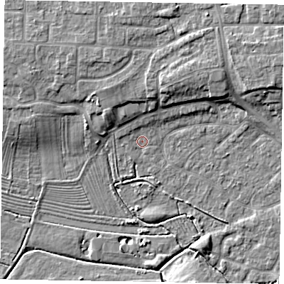 Shaded relief map of the ground around NG243HP, computed from Environment Agency LiDAR. The ground here sits at about 13 m above sea level and falls 8 m across the surrounding 800 m. Surface water reaching this point runs off ground lying to the north-north-east, 6.2 m higher.