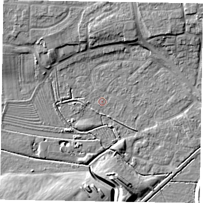 Shaded relief map of the ground around NG243HT, computed from Environment Agency LiDAR. The ground here sits at about 13 m above sea level and falls 11 m across the surrounding 800 m. Surface water reaching this point runs off ground lying to the north, 7.1 m higher.