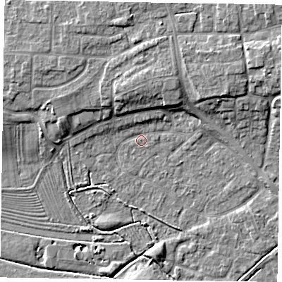 Shaded relief map of the ground around NG243HW, computed from Environment Agency LiDAR. The ground here sits at about 13 m above sea level and falls 9 m across the surrounding 800 m. Surface water reaching this point runs off ground lying to the north, 6.1 m higher.