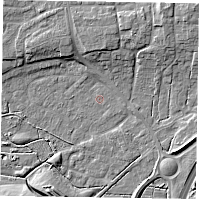 Shaded relief map of the ground around NG243JD, computed from Environment Agency LiDAR. The ground here sits at about 13 m above sea level and falls 10 m across the surrounding 800 m. Surface water reaching this point runs off ground lying to the north-east, 0.6 m higher.