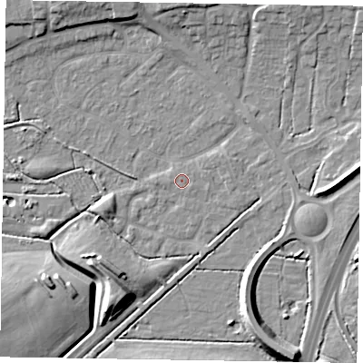 Shaded relief map of the ground around NG243JZ, computed from Environment Agency LiDAR. The ground here sits at about 13 m above sea level and falls 11 m across the surrounding 800 m. The ground contributing surface water to this point lies to the east-south-east.