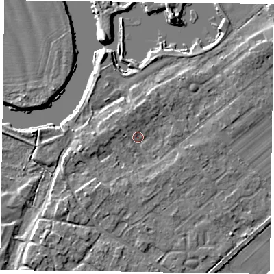 Shaded relief map of the ground around NG243SY, computed from Environment Agency LiDAR. The ground here sits at about 13 m above sea level and falls 6 m across the surrounding 800 m. Surface water reaching this point runs off ground lying to the south-west, 3.1 m higher.