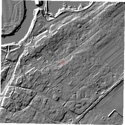 Shaded relief map of the ground around NG243SZ, computed from Environment Agency LiDAR. The ground here sits at about 13 m above sea level and falls 6 m across the surrounding 800 m. Surface water reaching this point runs off ground lying to the east-north-east, 1.9 m higher.