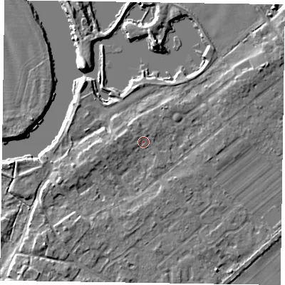 Shaded relief map of the ground around NG243TH, computed from Environment Agency LiDAR. The ground here sits at about 13 m above sea level and falls 6 m across the surrounding 800 m. Surface water reaching this point runs off ground lying to the north-north-west, 1.3 m higher.