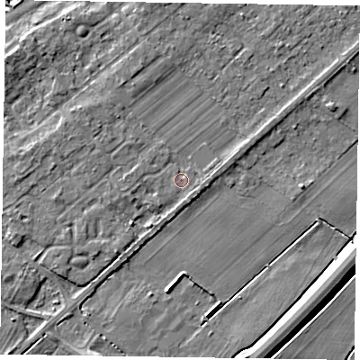 Shaded relief map of the ground around NG243TT, computed from Environment Agency LiDAR. The ground here sits at about 13 m above sea level and falls 5 m across the surrounding 800 m. The ground contributing surface water to this point lies to the south-west.