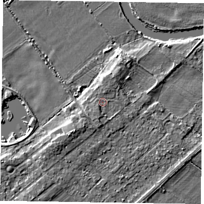 Shaded relief map of the ground around NG243TX, computed from Environment Agency LiDAR. The ground here sits at about 13 m above sea level and falls 5 m across the surrounding 800 m. Surface water reaching this point runs off ground lying to the south-south-west, 1.2 m higher.