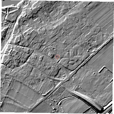 Shaded relief map of the ground around NG243UD, computed from Environment Agency LiDAR. The ground here sits at about 13 m above sea level and falls 12 m across the surrounding 800 m. Surface water reaching this point runs off ground lying to the west, 2.4 m higher.