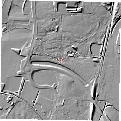 Shaded relief map of the ground around NG243WW, computed from Environment Agency LiDAR. The ground here sits at about 13 m above sea level and falls 11 m across the surrounding 800 m. Surface water reaching this point runs off ground lying to the north, 10.5 m higher.
