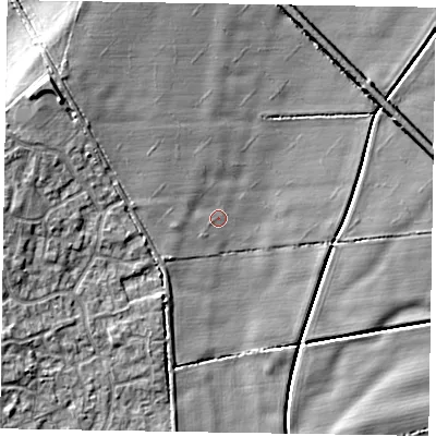Shaded relief map of the ground around NG243XJ, computed from Environment Agency LiDAR. The ground here sits at about 15 m above sea level and falls 9 m across the surrounding 800 m. Surface water reaching this point runs off ground lying to the west-north-west, 4.2 m higher.
