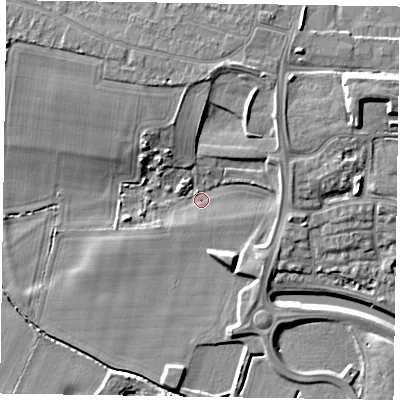 Shaded relief map of the ground around NG244FT, computed from Environment Agency LiDAR. The ground here sits at about 13 m above sea level and falls 12 m across the surrounding 800 m. Surface water reaching this point runs off ground lying to the north-north-east, 7.1 m higher.