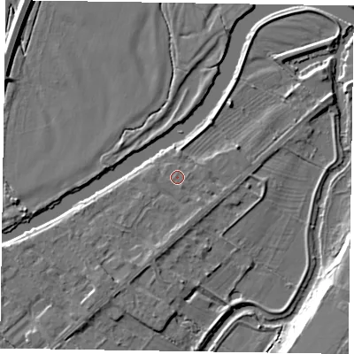 Shaded relief map of the ground around NG244SH, computed from Environment Agency LiDAR. The ground here sits at about 12 m above sea level and falls 9 m across the surrounding 800 m. Surface water reaching this point runs off ground lying to the south, 1.5 m higher.