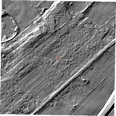 Shaded relief map of the ground around NG244SY, computed from Environment Agency LiDAR. The ground here sits at about 13 m above sea level and falls 5 m across the surrounding 800 m. Surface water reaching this point runs off ground lying to the north-west, 1.3 m higher.