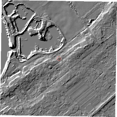 Shaded relief map of the ground around NG244TE, computed from Environment Agency LiDAR. The ground here sits at about 13 m above sea level and falls 6 m across the surrounding 800 m. Surface water reaching this point runs off ground lying to the east-north-east, 2.9 m higher.