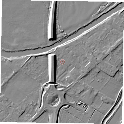 Shaded relief map of the ground around NG244XB, computed from Environment Agency LiDAR. The ground here sits at about 12 m above sea level and falls 9 m across the surrounding 800 m. Surface water reaching this point runs off ground lying to the east-south-east, 1.3 m higher.