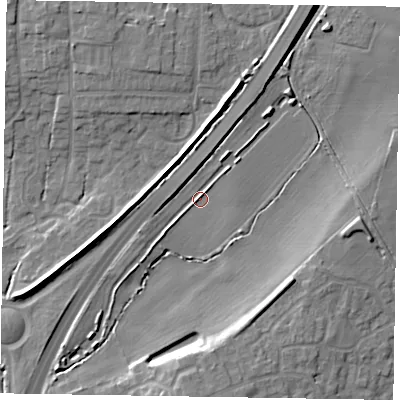 Shaded relief map of the ground around NG245BD, computed from Environment Agency LiDAR. The ground here sits at about 14 m above sea level and falls 10 m across the surrounding 800 m. Surface water reaching this point runs off ground lying to the north-north-east, 7.4 m higher.