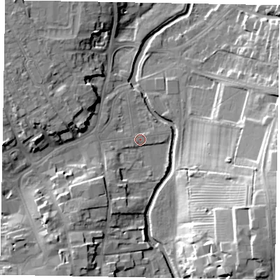Shaded relief map of the ground around NG318BT, computed from Environment Agency LiDAR. The ground here sits at about 51 m above sea level and falls 22 m across the surrounding 800 m. Surface water reaching this point runs off ground lying to the south-west, 6.9 m higher.