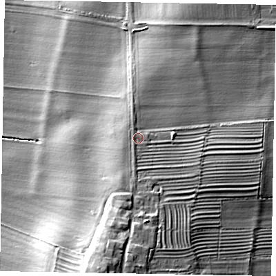 Shaded relief map of the ground around NG322LJ, computed from Environment Agency LiDAR. The ground here sits at about 33 m above sea level and falls 17 m across the surrounding 800 m. Surface water reaching this point runs off ground lying to the south, 1.8 m higher.