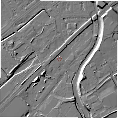 Shaded relief map of the ground around NG72UR, computed from Environment Agency LiDAR. The ground here sits at about 25 m above sea level and falls 16 m across the surrounding 800 m. Surface water reaching this point runs off ground lying to the north-north-west, 2.3 m higher.