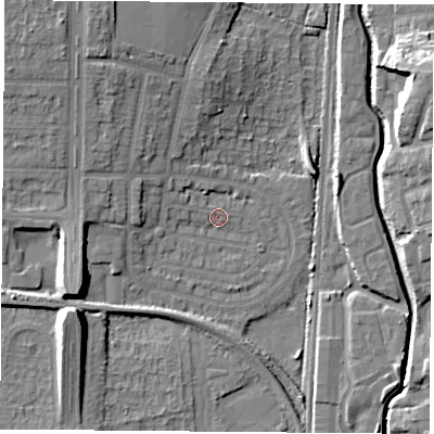 Shaded relief map of the ground around NG83PR, computed from Environment Agency LiDAR. The ground here sits at about 31 m above sea level and falls 14 m across the surrounding 800 m. Surface water reaching this point runs off ground lying to the west-north-west, 4.1 m higher.