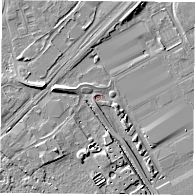 Shaded relief map of the ground around NG901LP, computed from Environment Agency LiDAR. The ground here sits at about 26 m above sea level and falls 11 m across the surrounding 800 m. Surface water reaching this point runs off ground lying to the south, 2.1 m higher.