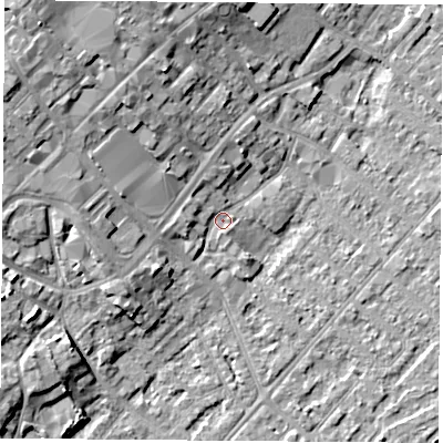 Shaded relief map of the ground around NG92AT, computed from Environment Agency LiDAR. The ground here sits at about 27 m above sea level and falls 12 m across the surrounding 800 m. Surface water reaching this point runs off ground lying to the north-west, 10.2 m higher.