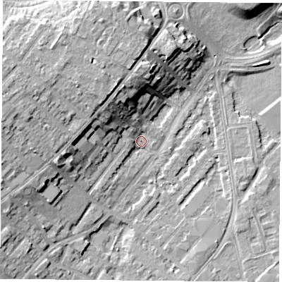 Shaded relief map of the ground around NG92AX, computed from Environment Agency LiDAR. The ground here sits at about 26 m above sea level and falls 13 m across the surrounding 800 m. Surface water reaching this point runs off ground lying to the north-north-west, 12.4 m higher.