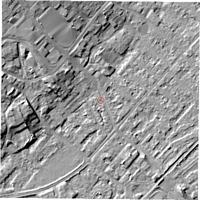Shaded relief map of the ground around NG92AY, computed from Environment Agency LiDAR. The ground here sits at about 27 m above sea level and falls 10 m across the surrounding 800 m. Surface water reaching this point runs off ground lying to the north-west, 9.1 m higher.