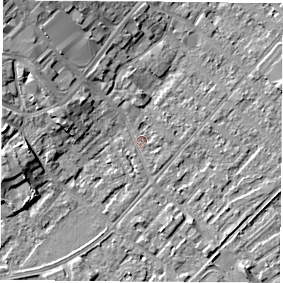 Shaded relief map of the ground around NG92AZ, computed from Environment Agency LiDAR. The ground here sits at about 27 m above sea level and falls 9 m across the surrounding 800 m. Surface water reaching this point runs off ground lying to the north-west, 8.4 m higher.