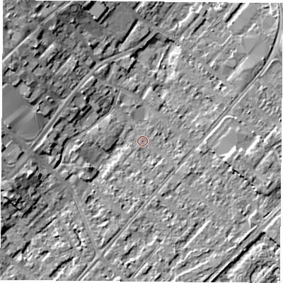 Shaded relief map of the ground around NG92DL, computed from Environment Agency LiDAR. The ground here sits at about 26 m above sea level and falls 10 m across the surrounding 800 m. Surface water reaching this point runs off ground lying to the west-south-west, 6.1 m higher.