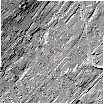 Shaded relief map of the ground around NG92FJ, computed from Environment Agency LiDAR. The ground here sits at about 26 m above sea level and falls 10 m across the surrounding 800 m. Surface water reaching this point runs off ground lying to the west, 1.1 m higher.
