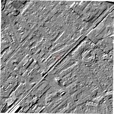 Shaded relief map of the ground around NG92XE, computed from Environment Agency LiDAR. The ground here sits at about 27 m above sea level and falls 9 m across the surrounding 800 m. Surface water reaching this point runs off ground lying to the south-south-west, 0.8 m higher.