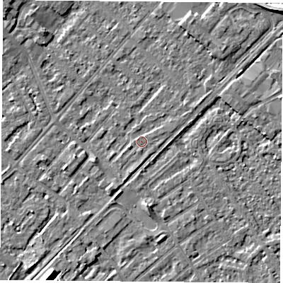 Shaded relief map of the ground around NG92XG, computed from Environment Agency LiDAR. The ground here sits at about 27 m above sea level and falls 9 m across the surrounding 800 m. Surface water reaching this point runs off ground lying to the east-north-east, 1.0 m higher.