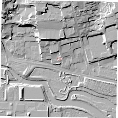 Shaded relief map of the ground around NN15NX, computed from Environment Agency LiDAR. The ground here sits at about 61 m above sea level and falls 24 m across the surrounding 800 m. Surface water reaching this point runs off ground lying to the north, 12.2 m higher.
