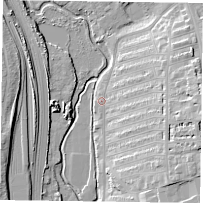 Shaded relief map of the ground around NN26DA, computed from Environment Agency LiDAR. The ground here sits at about 63 m above sea level and falls 24 m across the surrounding 800 m. Surface water reaching this point runs off ground lying to the east, 19.5 m higher.