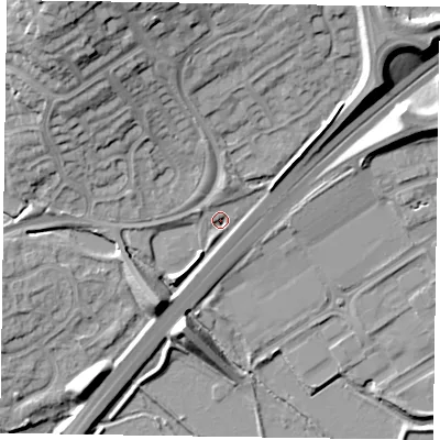 Shaded relief map of the ground around NN33LF, computed from Environment Agency LiDAR. The ground here sits at about 56 m above sea level and falls 23 m across the surrounding 800 m. Surface water reaching this point runs off ground lying to the south-west, 9.0 m higher.