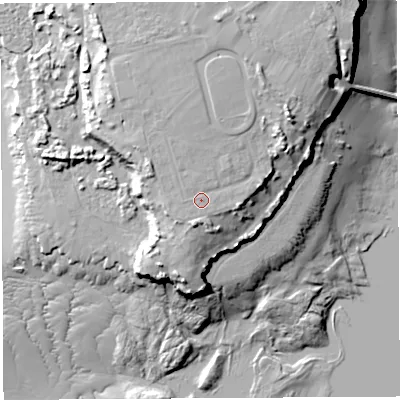 Shaded relief map of the ground around NP167HR, computed from Environment Agency LiDAR. The ground here sits at about 16 m above sea level and falls 24 m across the surrounding 800 m. Surface water reaching this point runs off ground lying to the north-north-west, 1.1 m higher.